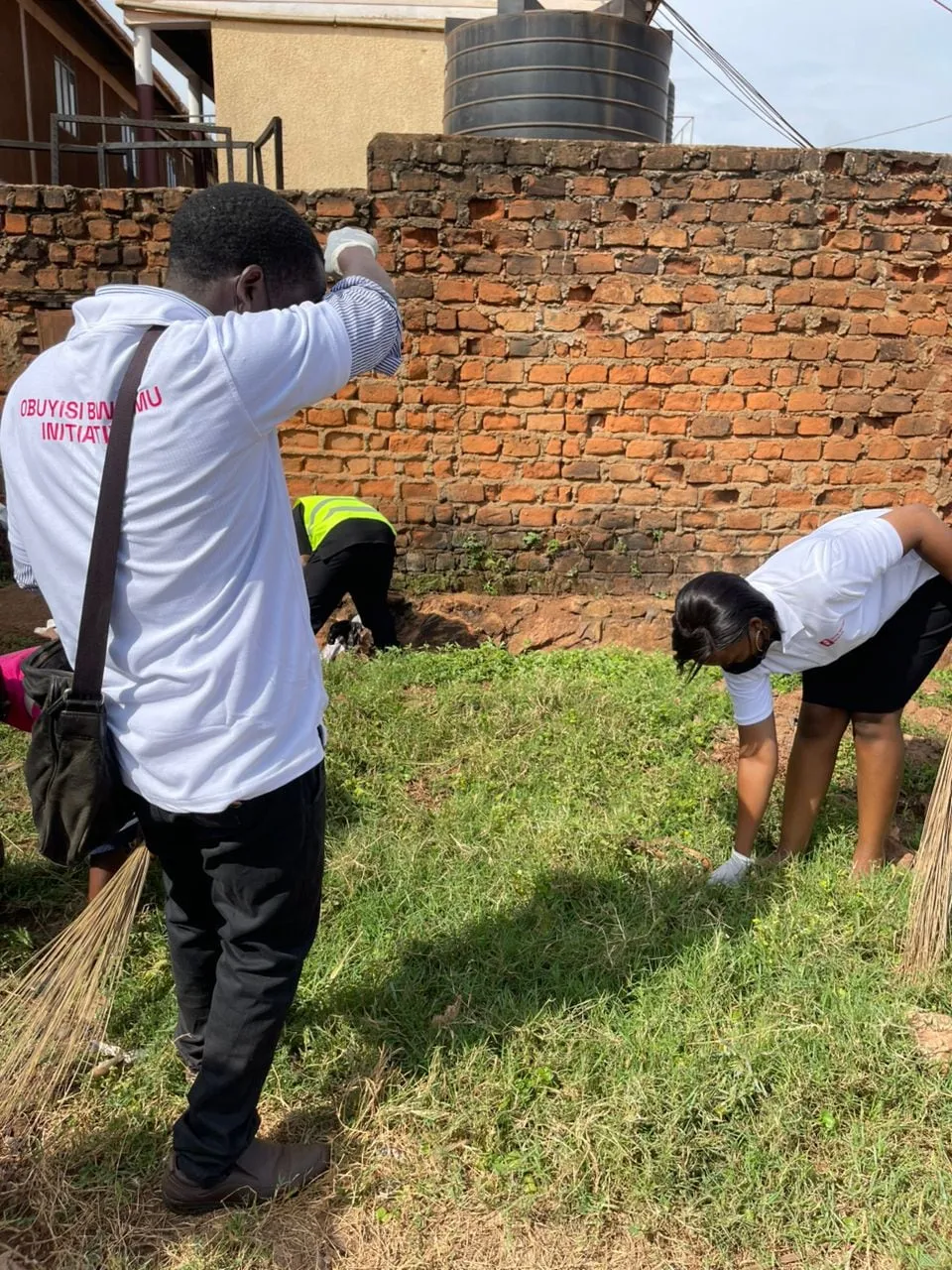 Volunteers clearing and tending a green space